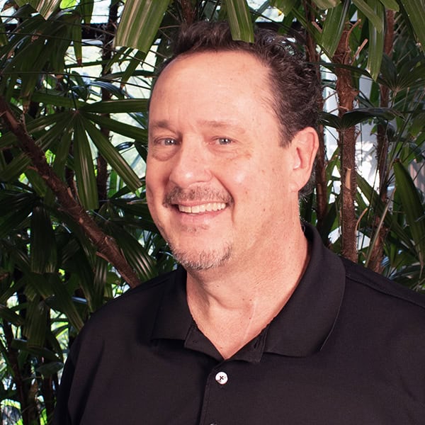About Us 27 Tom DeBell Headshot